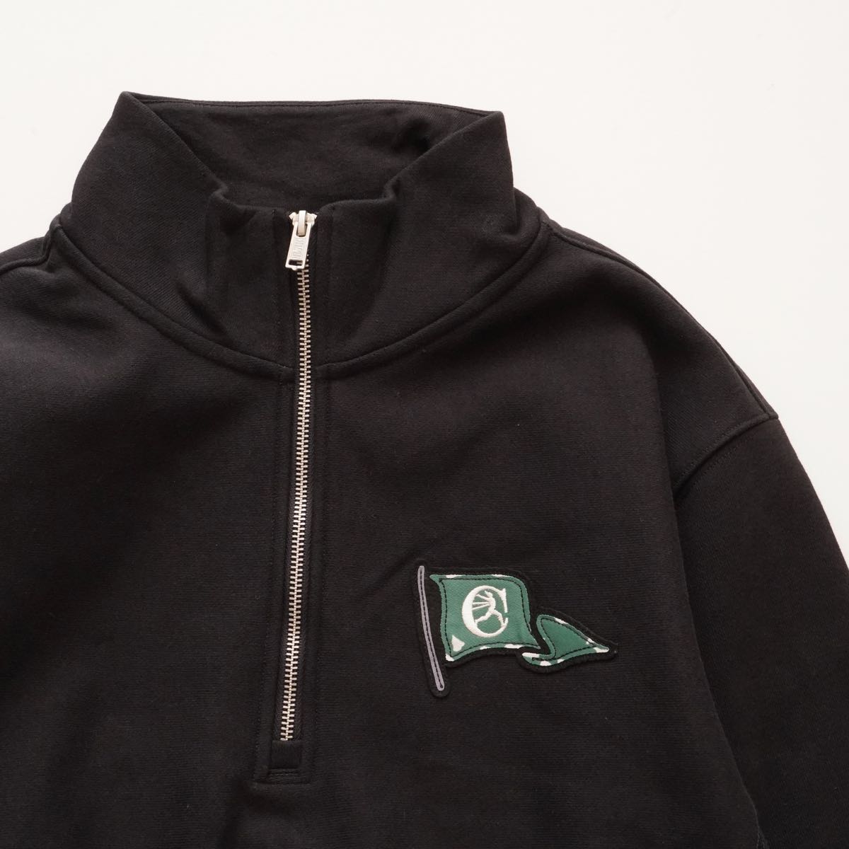 チャンピオン ブラック ランタグフラグ ワンポイントワッペン ハーフジップ スウェット CHAMPION BLACK RUN-TAG FLAG HALF-ZIP SWEAT MENS